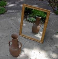 إذا تم وضع كائن أمام مرآة مستوية ، فإن النسبة بين طول الصورة وطول الكائن هي .............