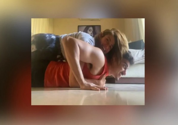 كيف ردت الفنانة هيدي كرم على منتقدي فيديو لها مع ابنها وهو يحملها على ظهره ويقوم بتمرين